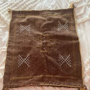 Brown Woven Textile with Geometric Patterns